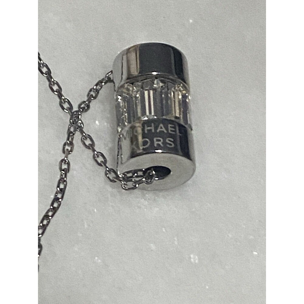 MICHAEL KORS SILVER TONE CRYSTAL BAGUETTE BARREL PENDANT NECKLACE-MKJ4950